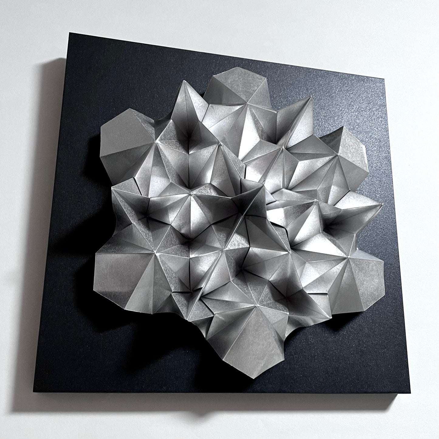 Thaumazein (Silver)