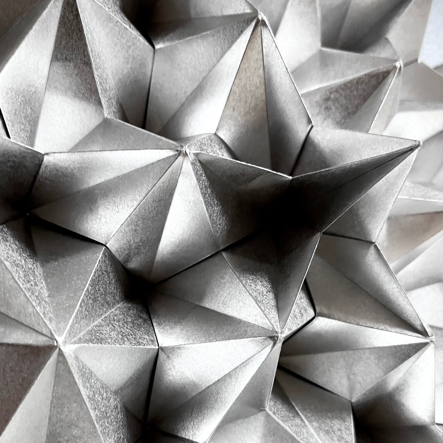 Thaumazein (Silver)